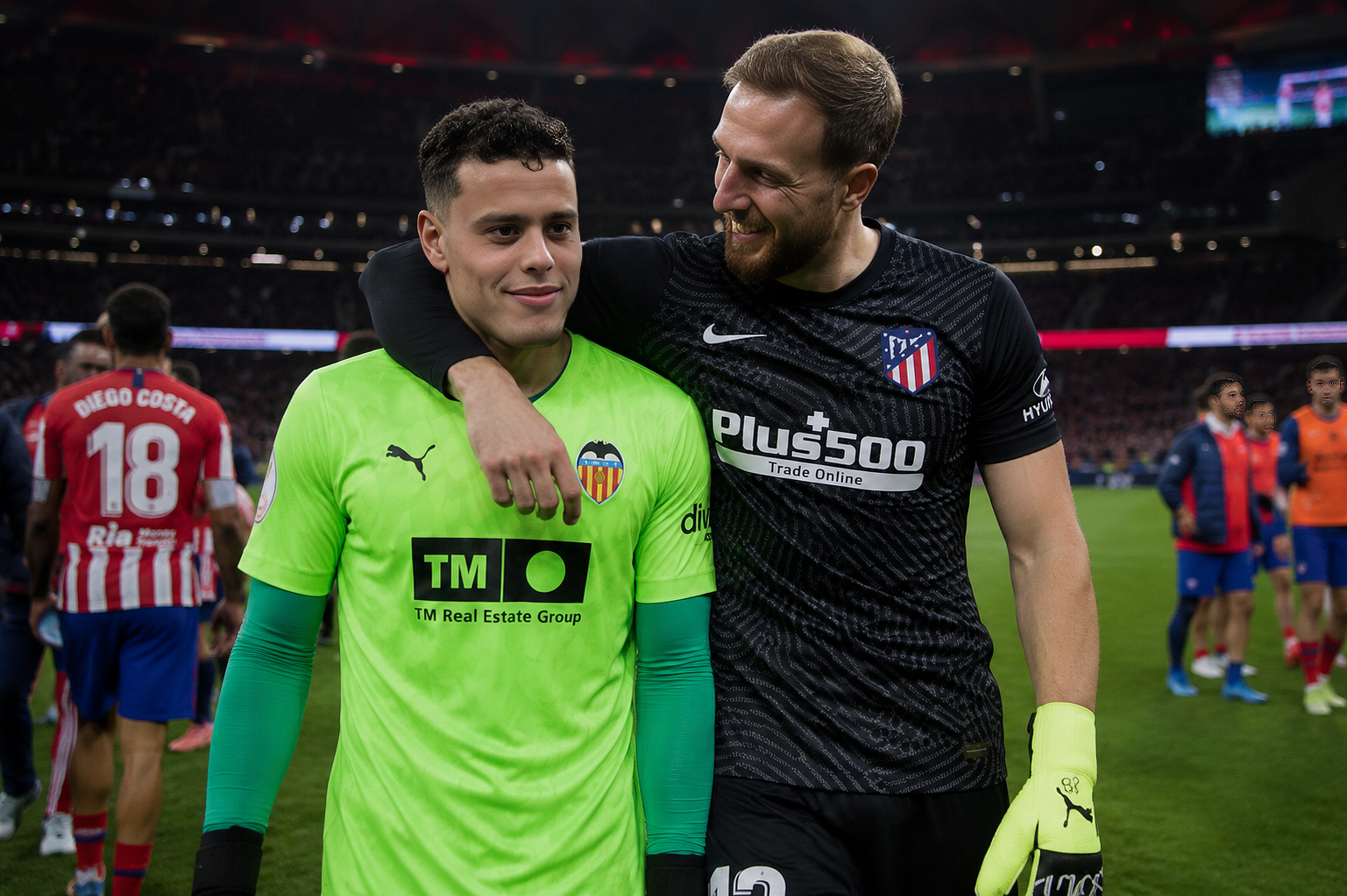 On-pitch embrace after a high-intensity encounter — Bilal Jabri Jabri with Jan Oblak, elite goalkeeper mentorship